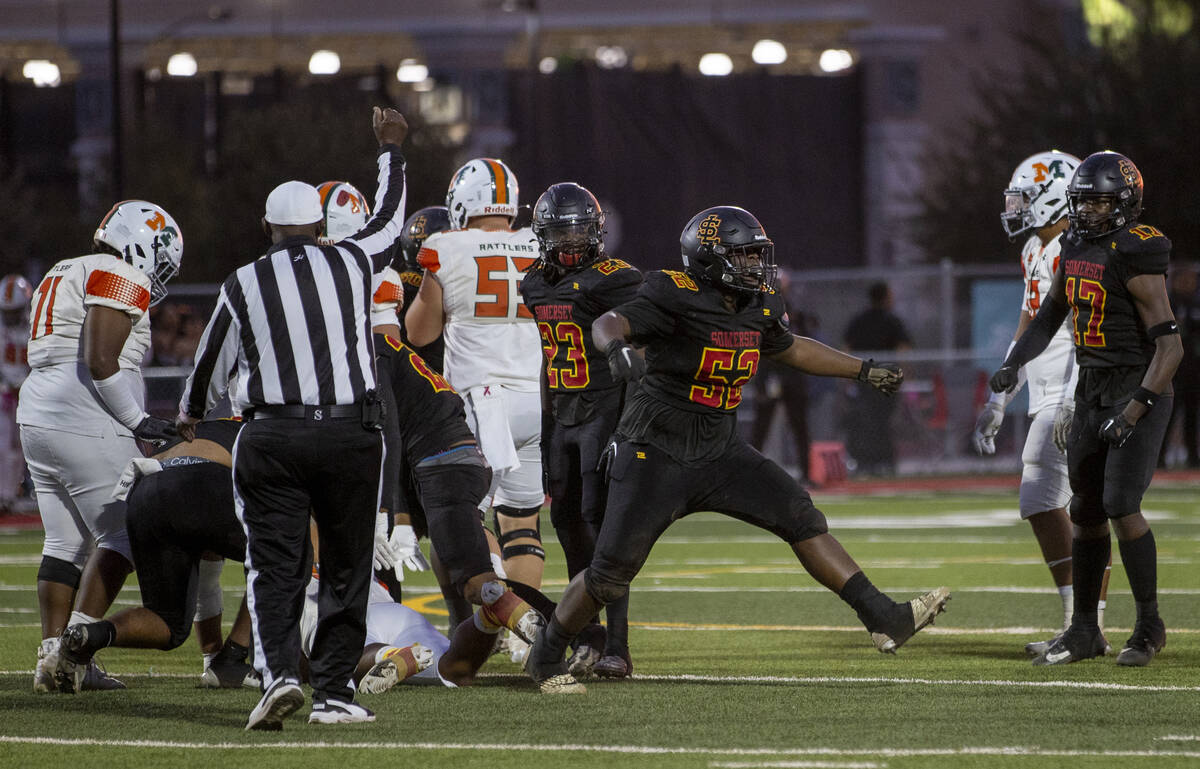 Losee junior Kalen Whilloughby (52) celebrates a tackle during the high school 4A Desert League ...