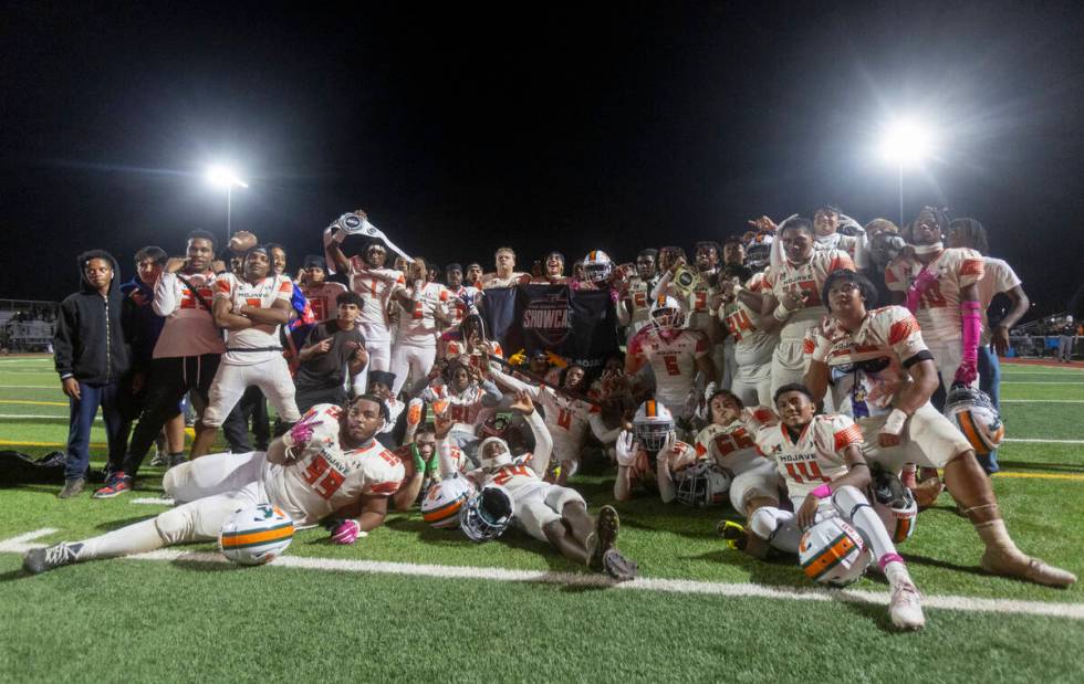 Mojave celebrates the 32-21 win over Losee after the high school 4A Desert League title footbal ...