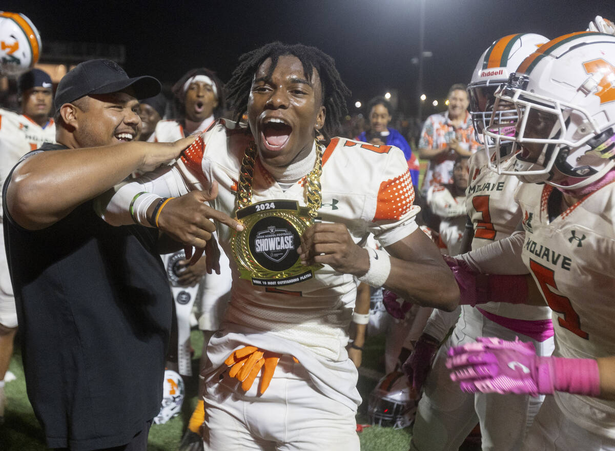 Mojave senior Arthur AJ Williams (2) celebrates receiving the Raiders Showcase Most Outstanding ...