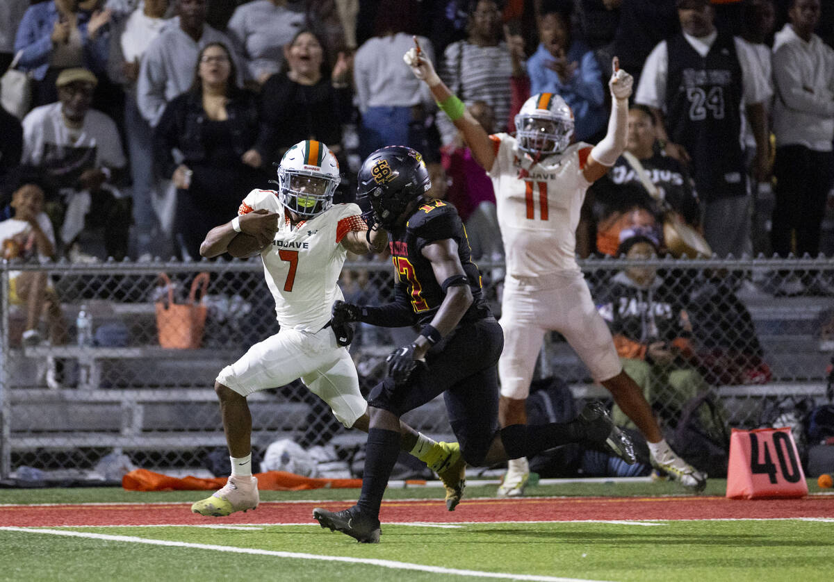 Mojave senior Antwan Hawkins (7) runs the ball for a huge gain during the high school 4A Desert ...