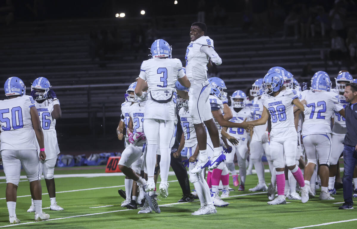 Centennial players celebrate after defeating Las Vegas in a football game at Las Vegas High Sch ...