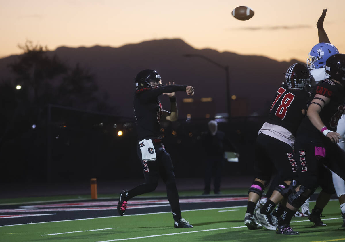 Las Vegas quarterback Tanner Vibabul (8) throws a pass during a football game against Centennia ...