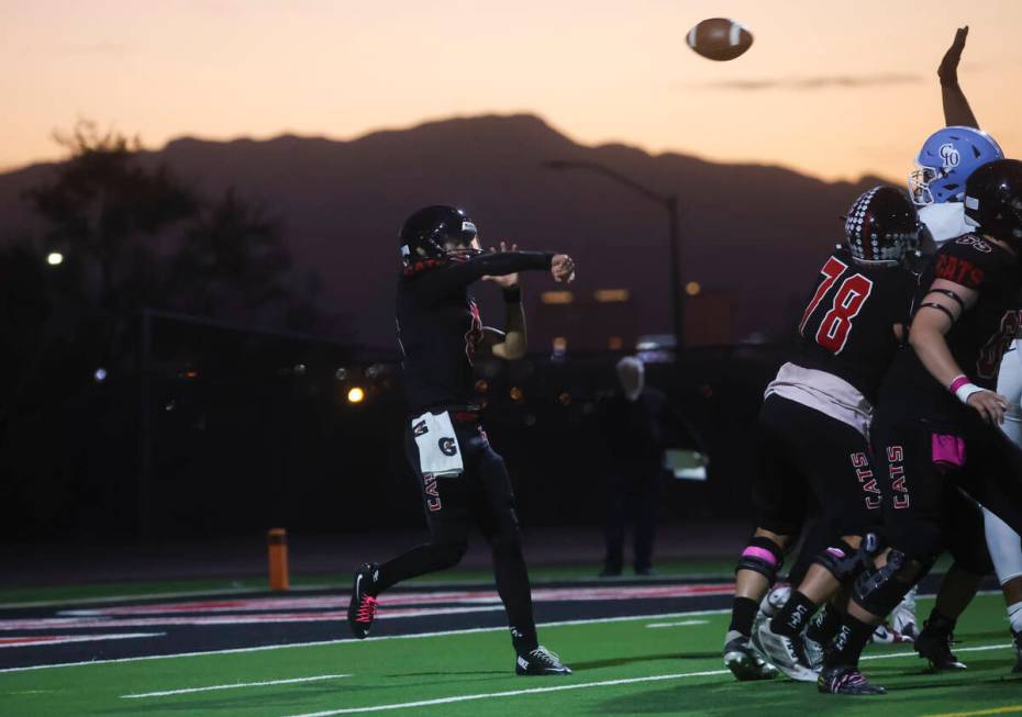 Las Vegas quarterback Tanner Vibabul (8) throws a pass during a football game against Centennia ...