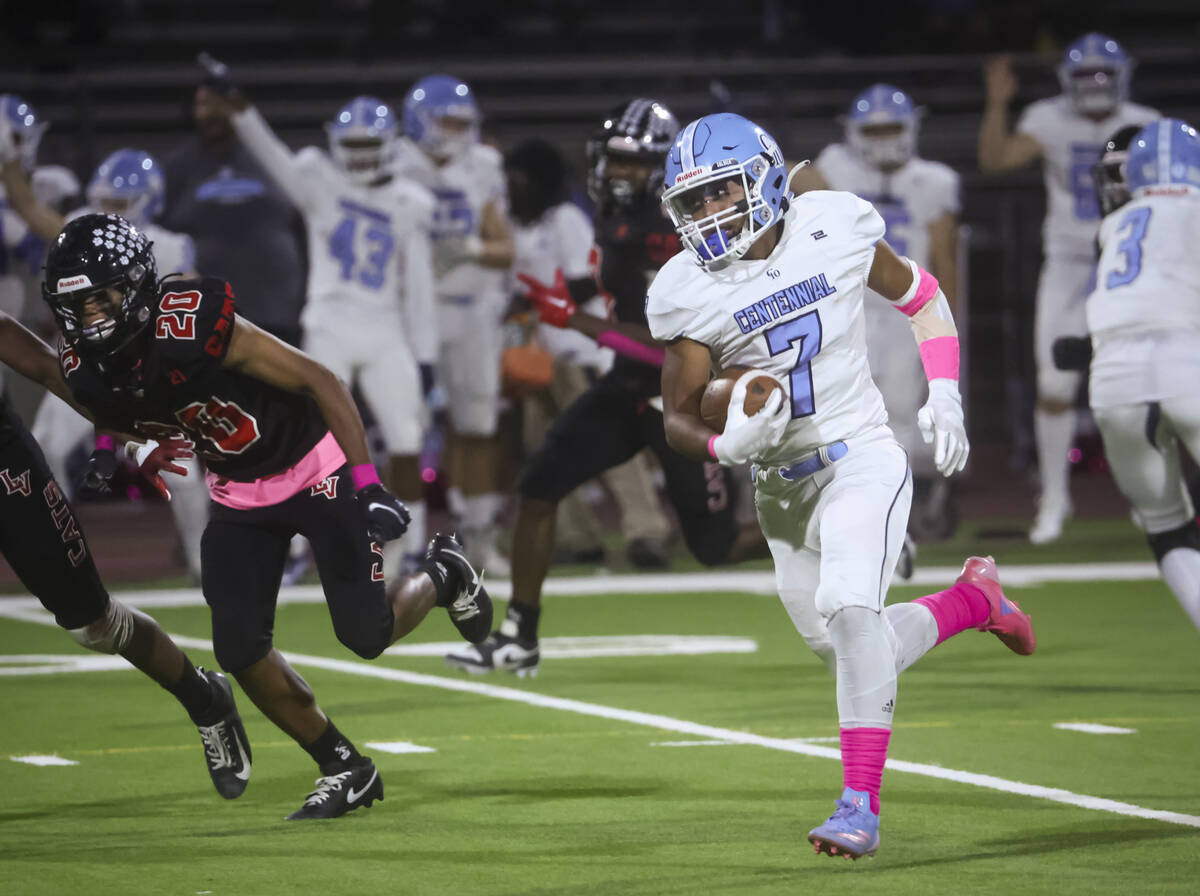 Centennial wide receiver Dale Flores Jr. (7) runs the ball during a football game at Las Vegas ...