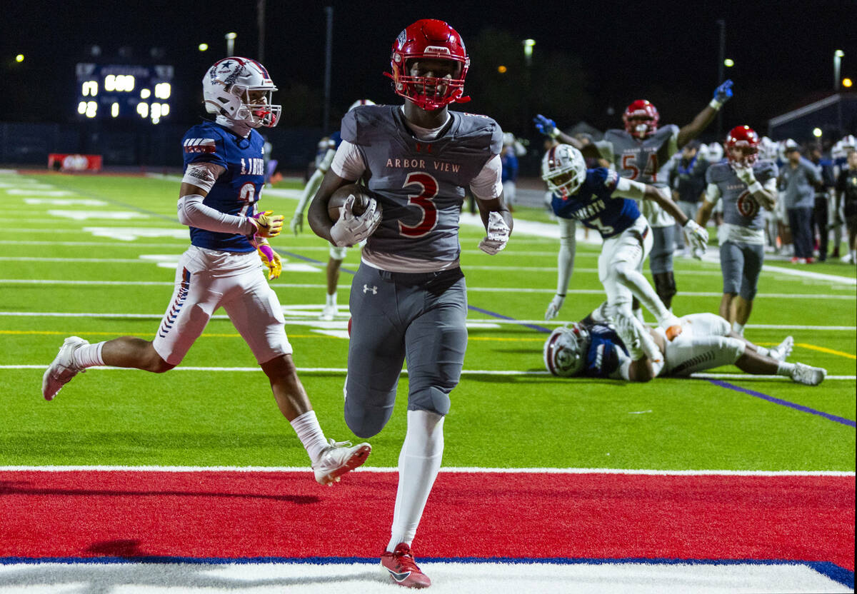 Arbor View wide receiver Damani Warren (3) eases into the end zone against Liberty defenders du ...