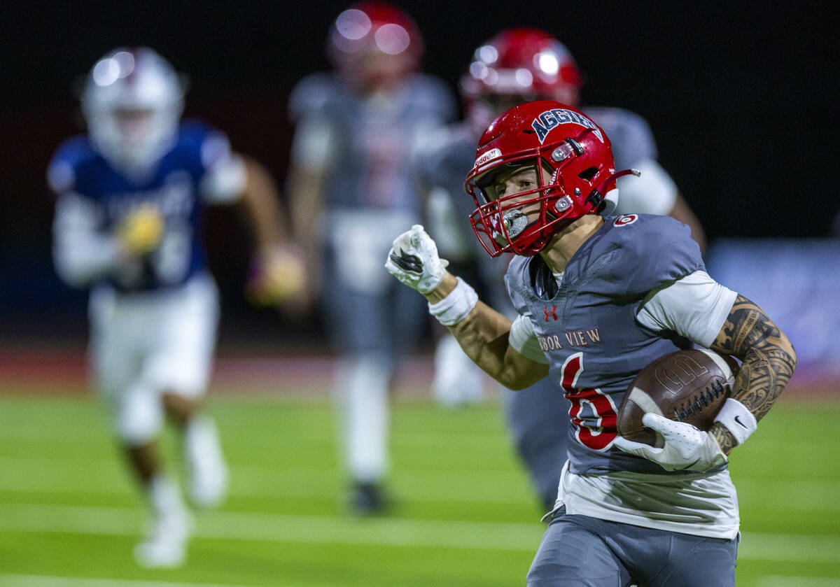 Arbor View wide receiver Jayden Williams (6) extends a catch for more yards down field against ...