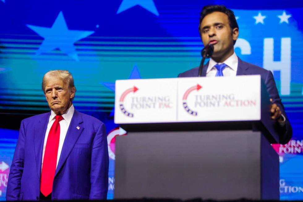 Republican presidential nominee former President Donald Trump, left, listens as former Republic ...