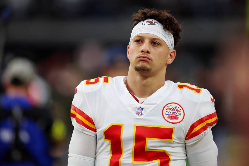 Kansas City Chiefs quarterback Patrick Mahomes (15) walks the field before the start of a NFL f ...