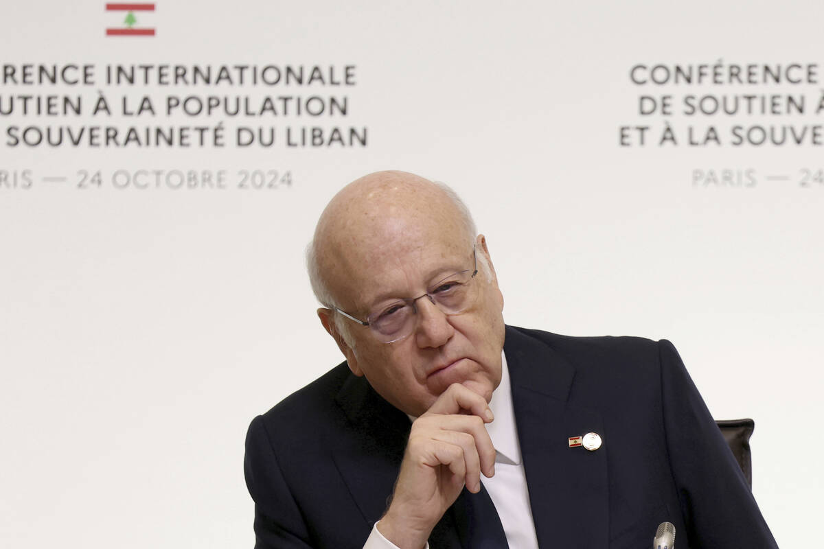 Lebanon's Prime Minister caretaker Prime Minister Najib Mikati attends an international confere ...