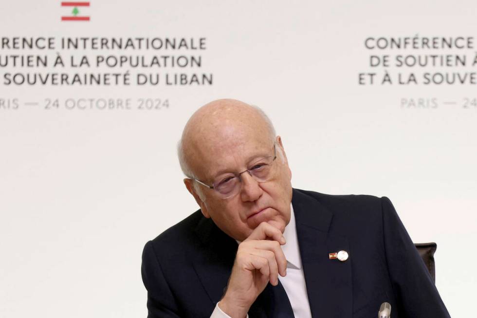 Lebanon's Prime Minister caretaker Prime Minister Najib Mikati attends an international confere ...