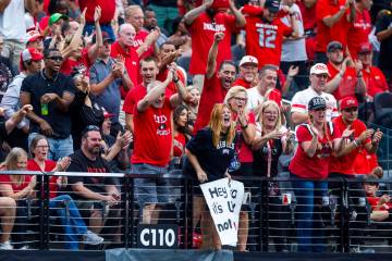 UNLV fans cheers another score against the Fresno State Bulldogs during the first half of their ...