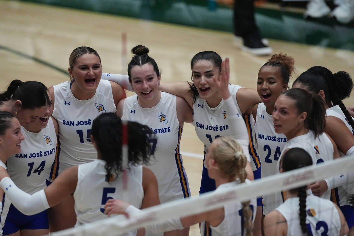 San Jose State players huddle before facing Colorado State in the first set of an NCAA college ...