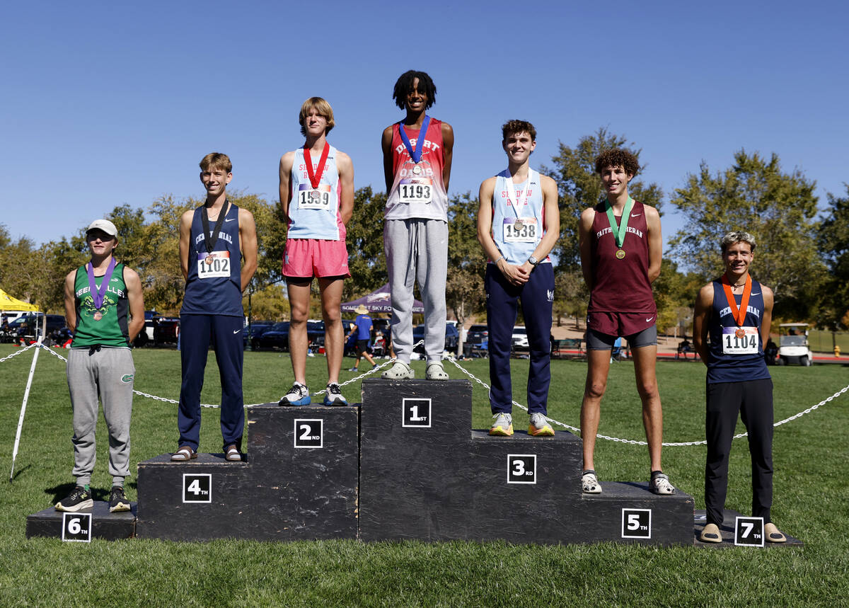 (Left to right) The 5A Southern Region boys cross country meet winners Andrew Poirier of Green ...