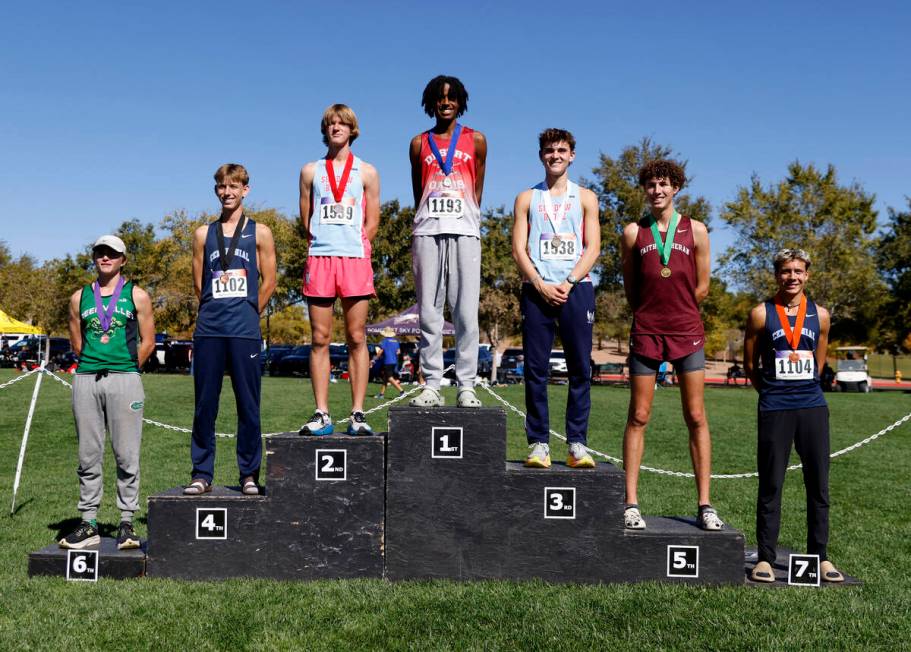 (Left to right) The 5A Southern Region boys cross country meet winners Andrew Poirier of Green ...