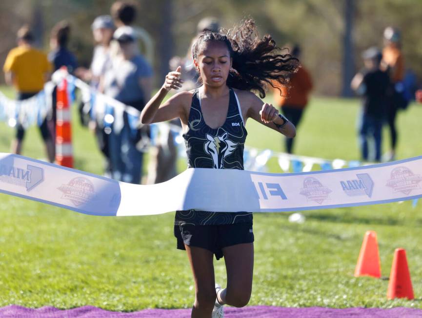 Vianey Toledo of Clark High crosses the finish line during the 4A Mountain girls cross country ...