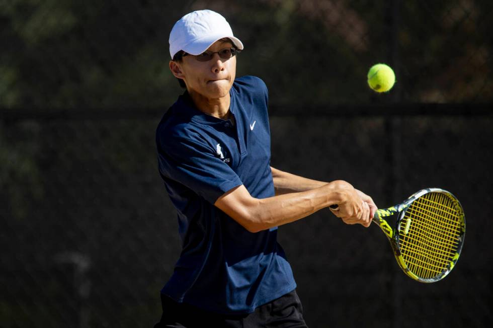 The Meadows junior Steven Tian competes during the tennis matches against Faith Lutheran at Fai ...