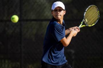 The Meadows junior Steven Tian competes during the tennis matches against Faith Lutheran at Fai ...