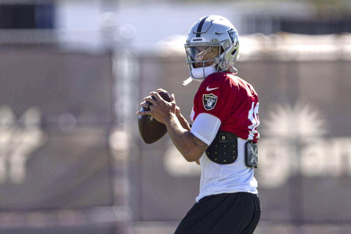 Raiders quarterback Desmond Ridder (10) prepares to throw the football during team practice at ...