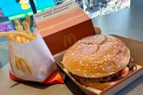 A McDonald's Quarter Pounder hamburger and fries are shown in this photograph, in New York's Ti ...