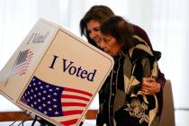 Republican presidential candidate former UN Ambassador Nikki Haley helps her mother Raj Kaur Ra ...