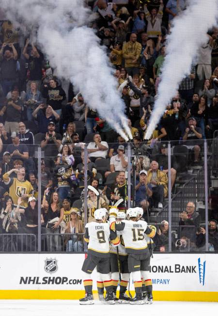 The Golden Knights celebrate a goal during the second period of the NHL hockey game against the ...