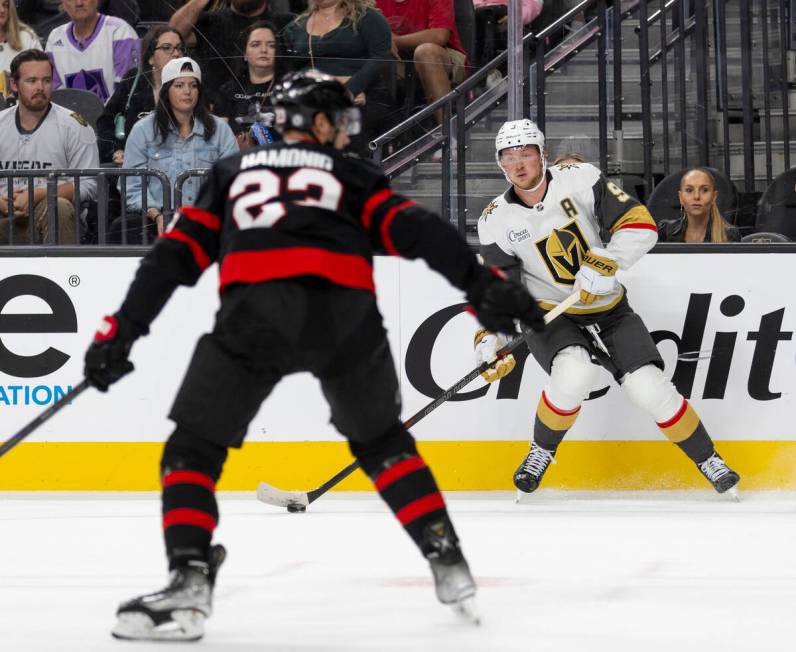 Golden Knights center Jack Eichel (9) looks to pass the puck during the NHL hockey game against ...