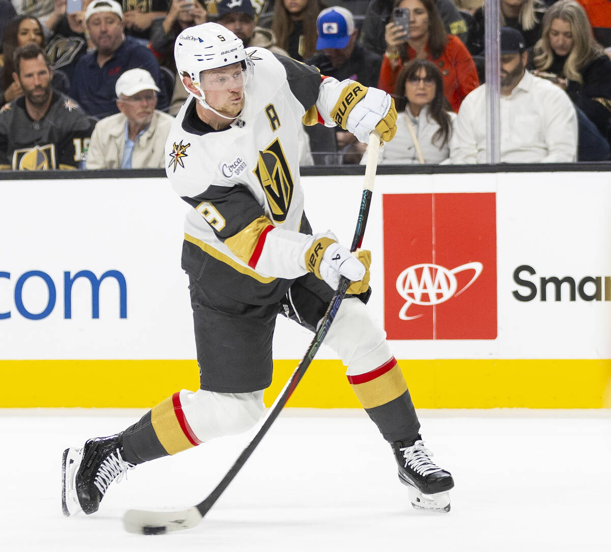 Golden Knights center Jack Eichel (9) shoots the puck during the first period of the NHL hockey ...