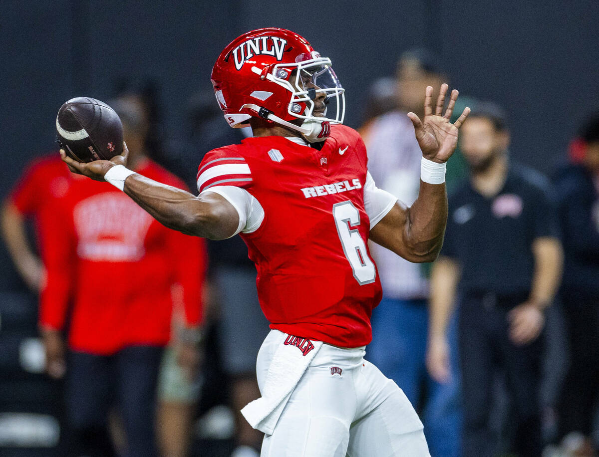 UNLV quarterback Hajj-Malik Williams (6) gets off a pass during warm ups of their NCAA football ...