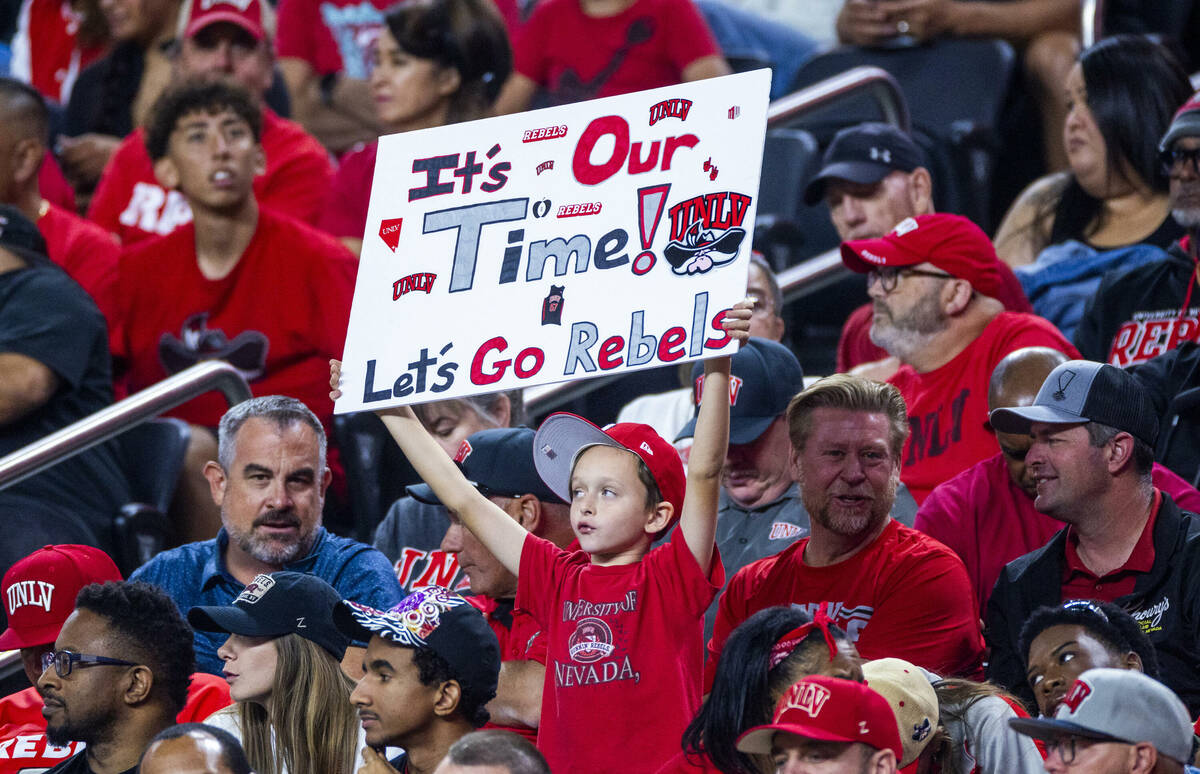 A young UNLV fan shows his support against the Boise State Broncos during the second half of th ...