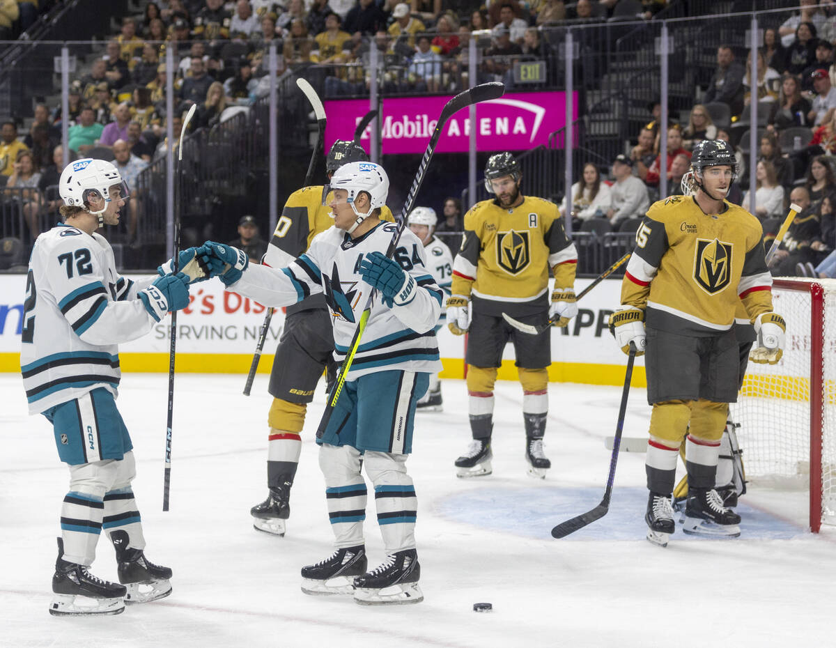 San Jose Sharks left wing William Eklund (72) and San Jose Sharks center Mikael Granlund (64) c ...