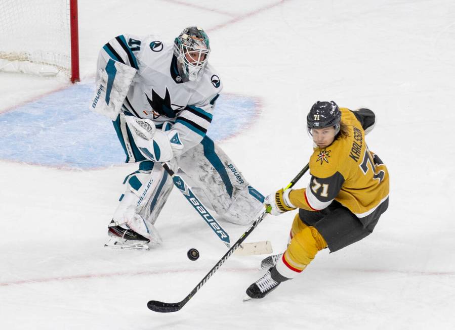 San Jose Sharks goaltender Vitek Vanecek (41) shoots the puck past Golden Knights center Willia ...