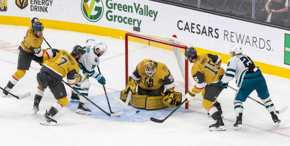 The puck lands in front of Golden Knights goaltender Ilya Samsonov (35) during the third period ...