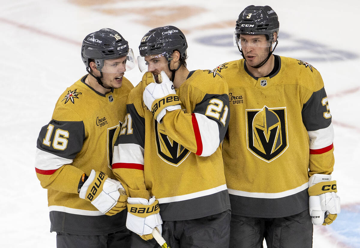 Golden Knights left wing Pavel Dorofeyev (16), center Brett Howden (21) and defenseman Brayden ...