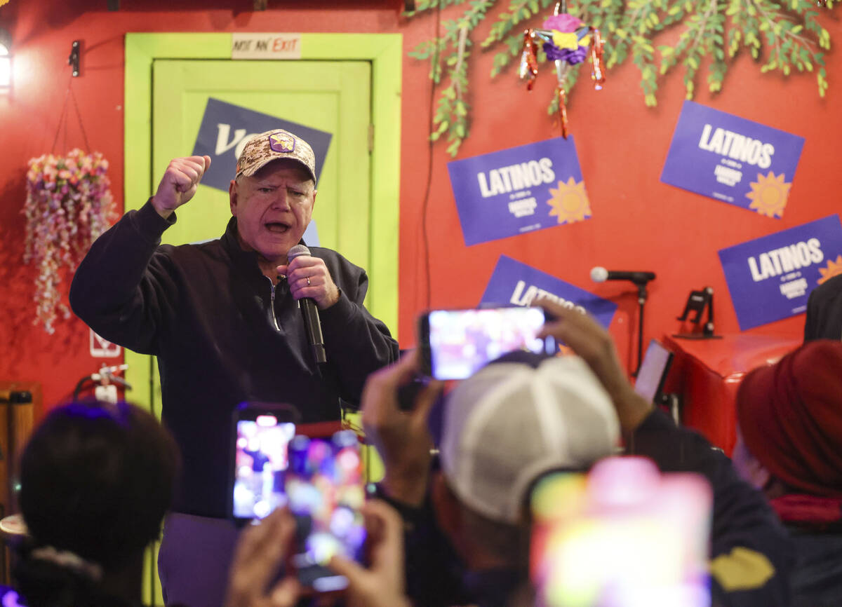 Democratic vice presidential candidate Tim Walz greets supporters at a Latinos con Harris-Walz ...