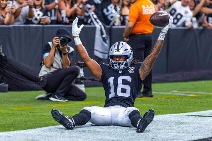 Raiders wide receiver Jakobi Meyers (16) celebrates a pass reception in the end zone as Carolin ...