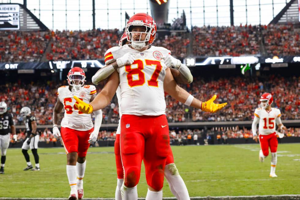 Kansas City Chiefs tight end Travis Kelce (87) reacts after scoring a touchdown during the firs ...