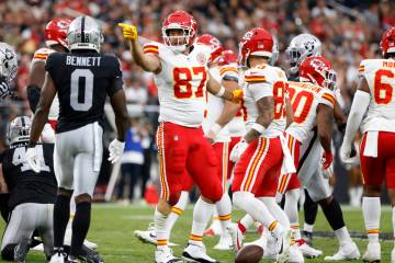 Kansas City Chiefs tight end Travis Kelce (87) signals after a play on first down during the fi ...