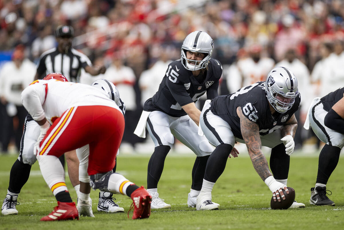 Raiders quarterback Gardner Minshew (15) looks to snap the ball during the first half of the NF ...