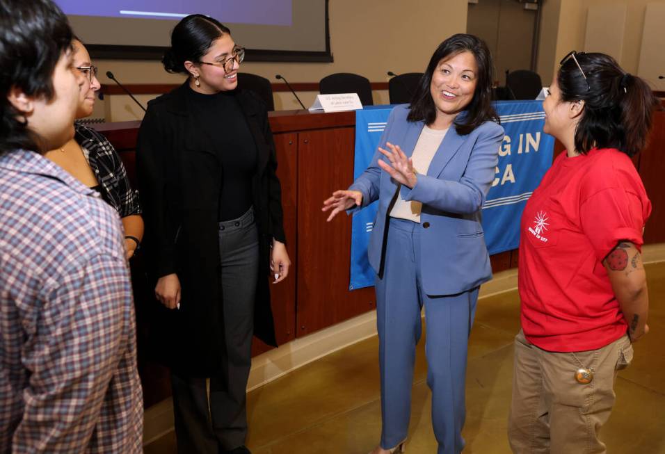 Acting Secretary of Labor Julie Su, second from right, visits with International Brotherhood of ...