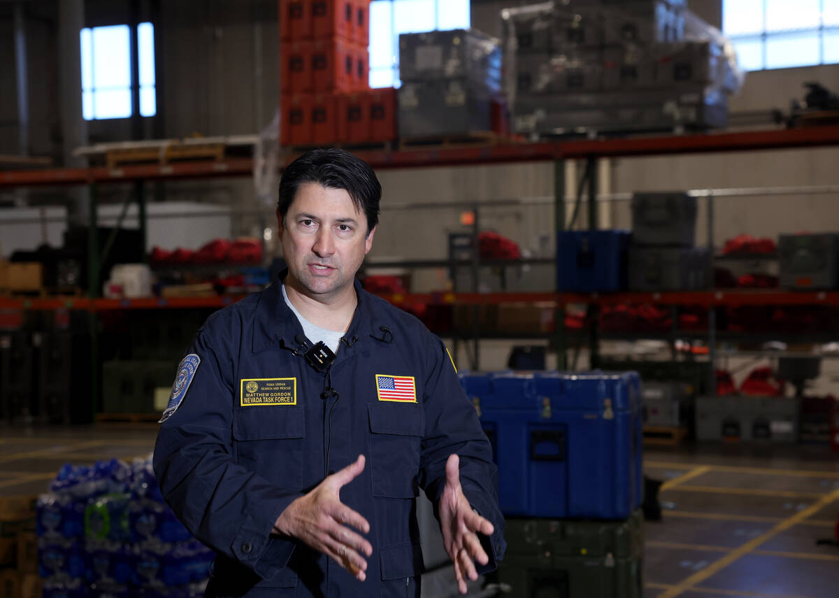 Nevada Task Force 1 team leader Matt Gordon talks to the media at the team’s warehouse i ...