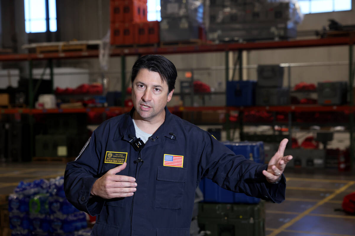 Nevada Task Force 1 team leader Matt Gordon talks to the media at the team’s warehouse i ...