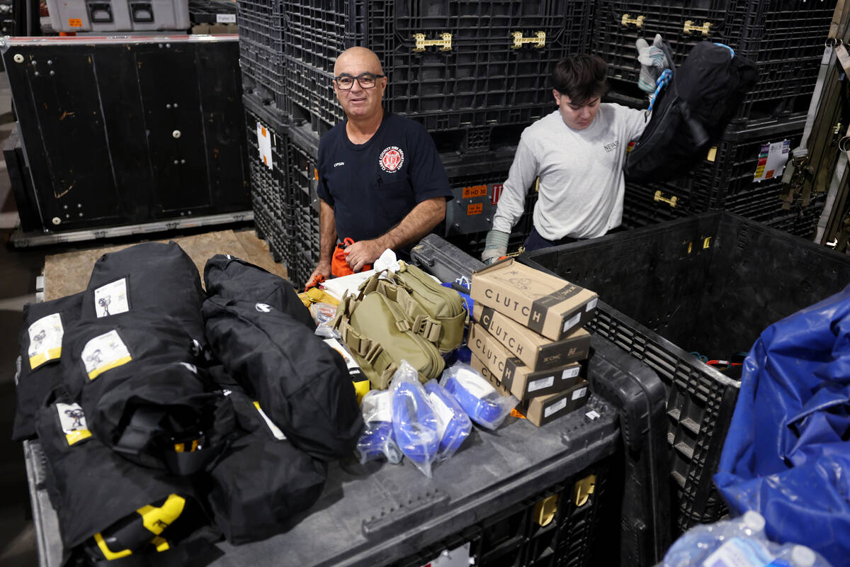 A Nevada Task Force 1 team member and warehouse worker, who declined to give their names, inven ...