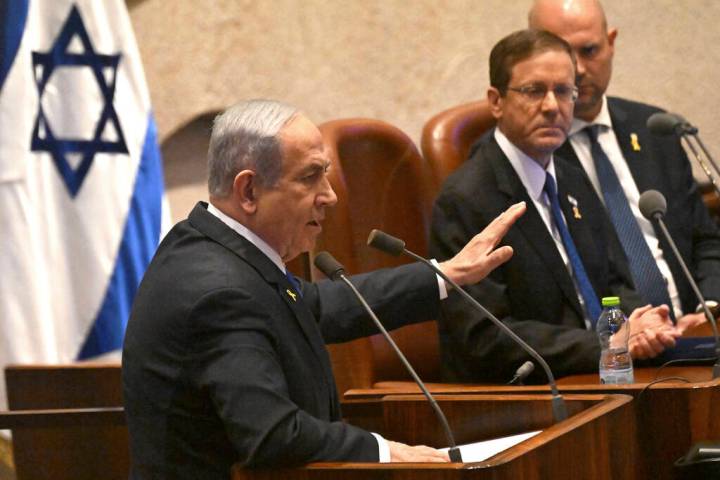 Israeli Prime Minister Benjamin Netanyahu speaks at the opening of the 25th Knesset session mar ...