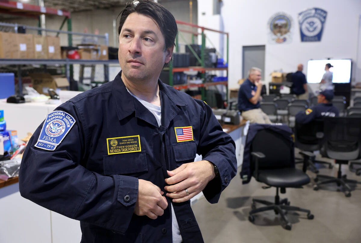 Nevada Task Force 1 team leader Matt Gordon arrives for a press conference at the team’s ware ...