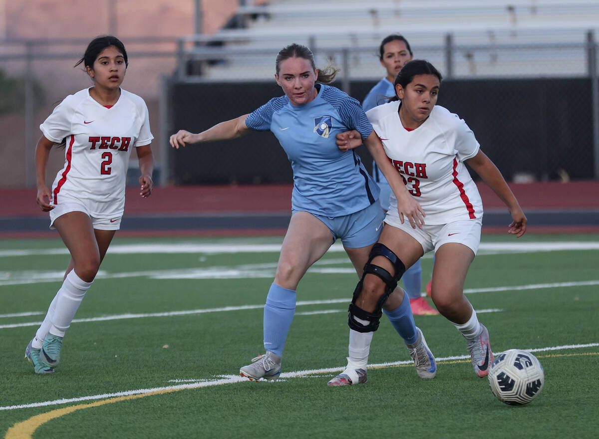 Foothill High School’s Lucy Anderson (7) attempts to steal the ball from Southeast Caree ...