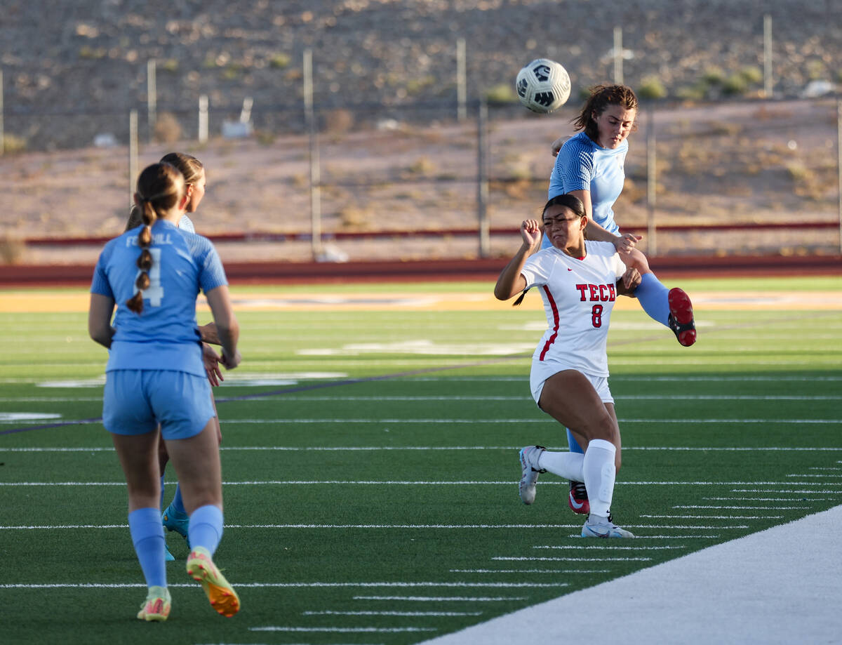 Foothill High School’s Riley Aldrich (13) kicks the ball past Southeast Career Technical ...