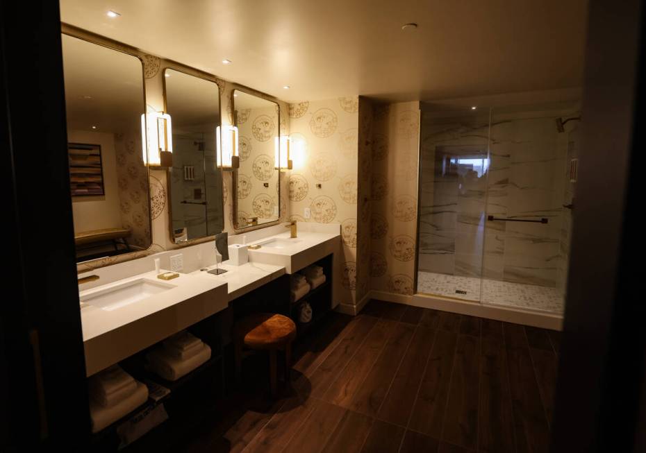 The bathroom for a premium single king room that can connect with other rooms at ...