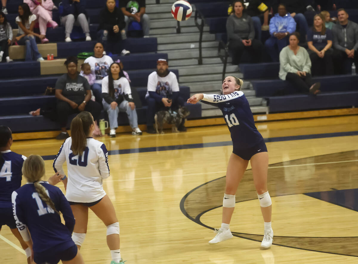 Centennial outside hitter Abby Vlaming (10) hits the ball over the net against Shadow Ridge dur ...