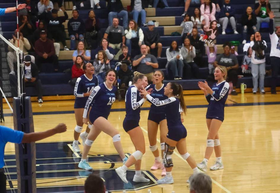 Centennial players celebrate after a play against Shadow Ridge during a Class 5A Southern Regio ...