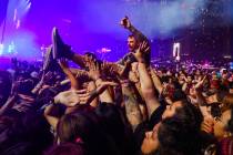 A festival attendee crowd surfs during A Day To Remember’s set at the When We Were Young ...